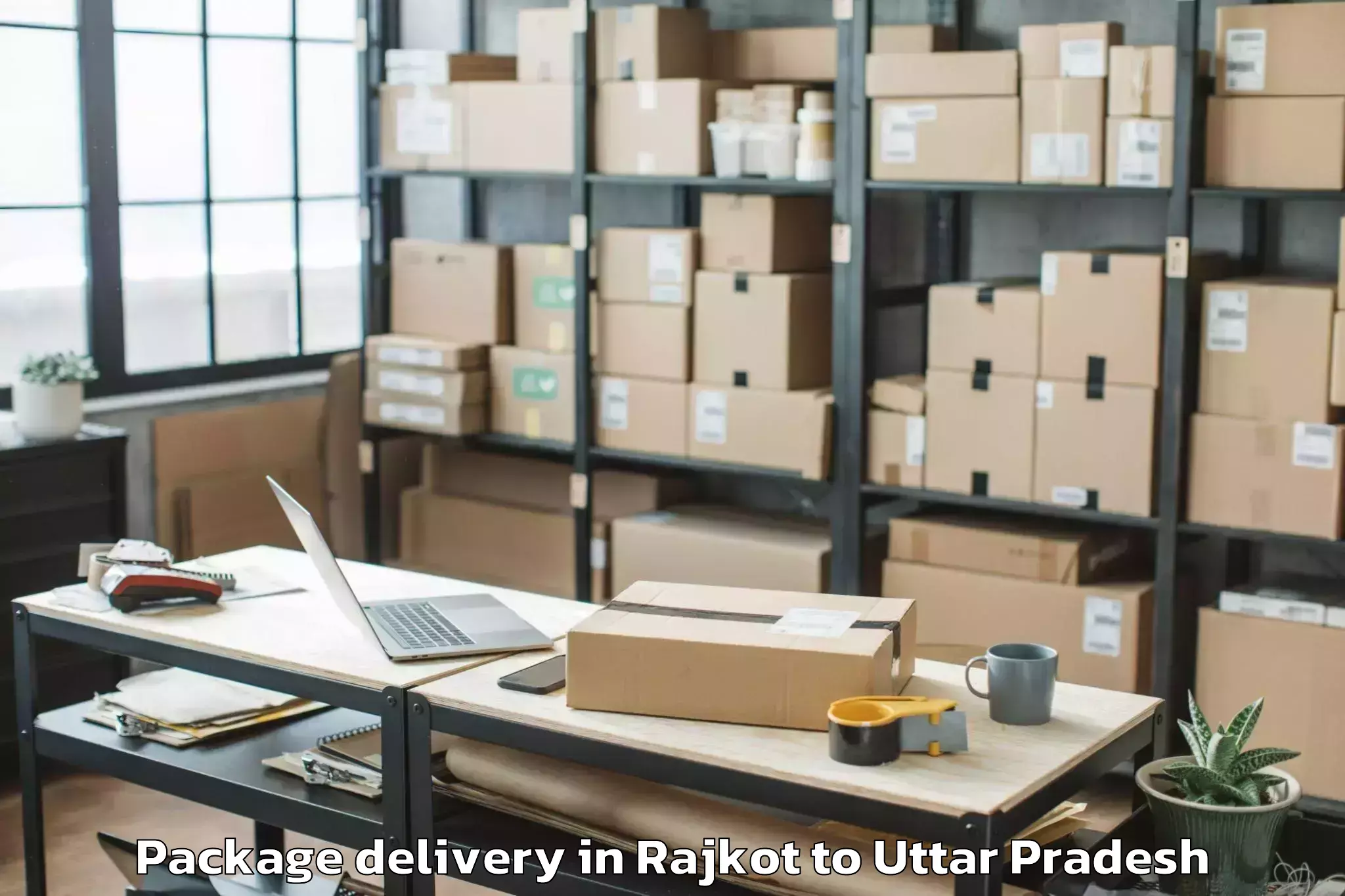 Reliable Rajkot to Madhoganj Package Delivery